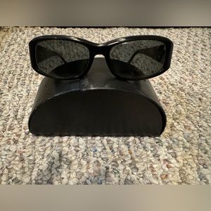 Beautiful black Prada sunglass frame with prescription lens ability